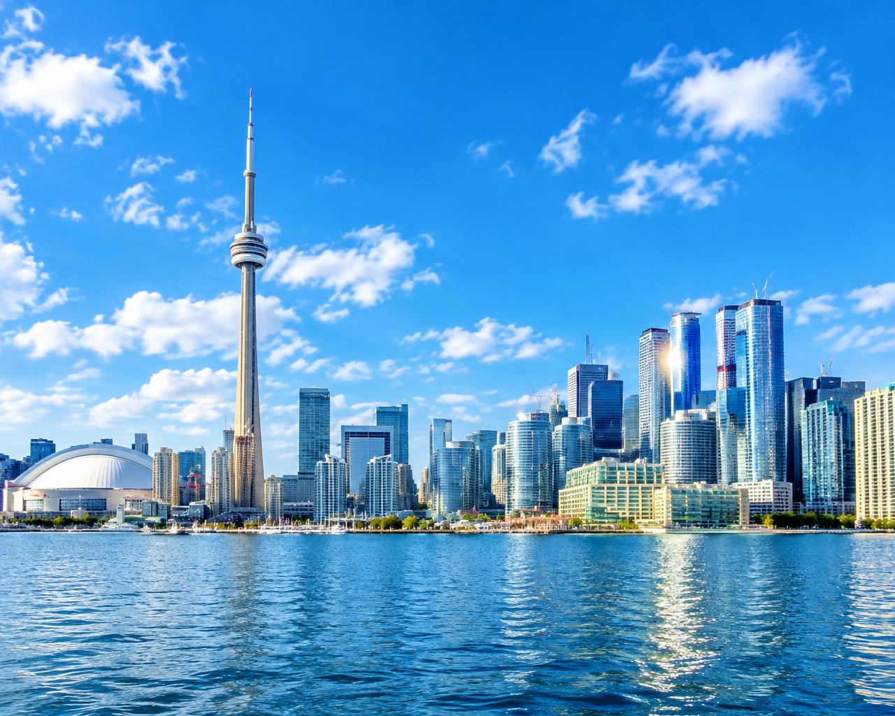 The bright downtown Toronto skyline where Aplis Global vendor partners deliver work every day